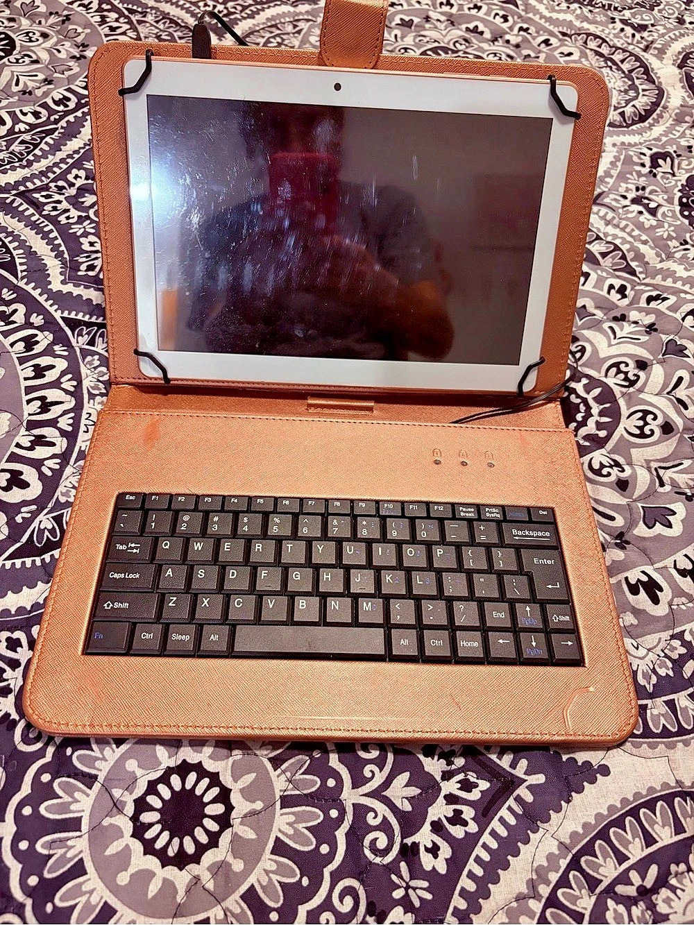 RCA Core Tablet PC with Keyboard Case in Rose Gold Pink.